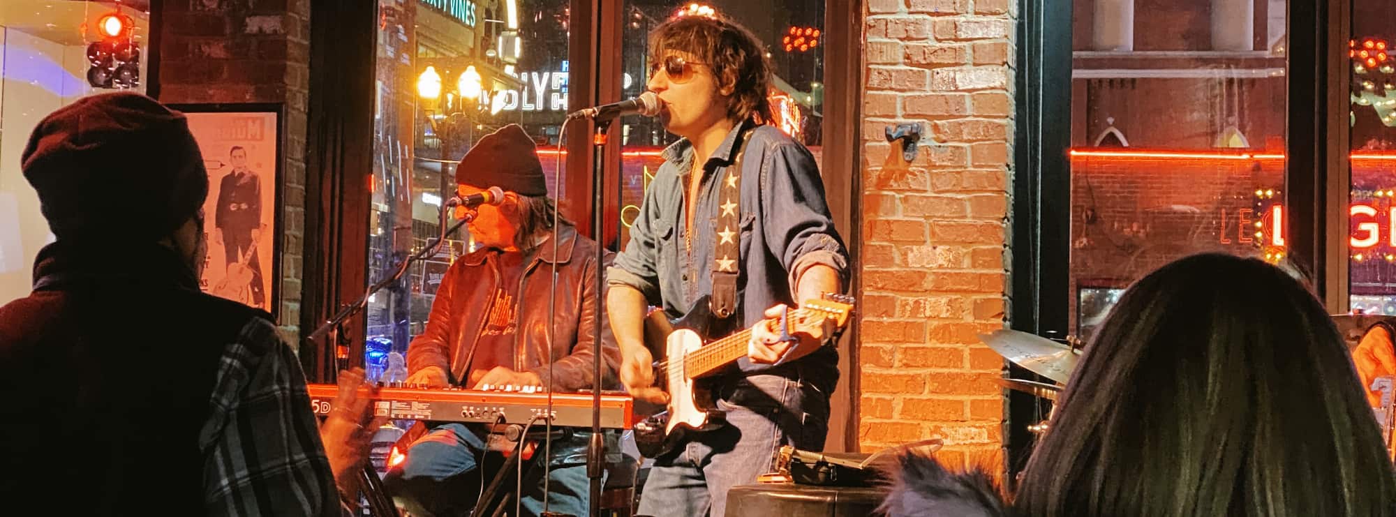 bar singer on guitar in Lubbock